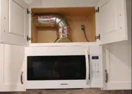 how to vent a microwave on an interior wall?